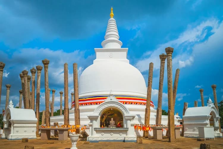 Ancient stupa of Thuparamaya surrounded by stone columns, believed to enshrine the Buddha’s collarbone relic.